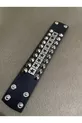 Bracelet gothique métal clouté d'étoiles de 4 cm