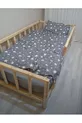 Lit d'enfant en bois naturel