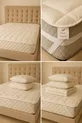 Matelas de sommeil capitonné en laine avec élastiques aux quatre coins