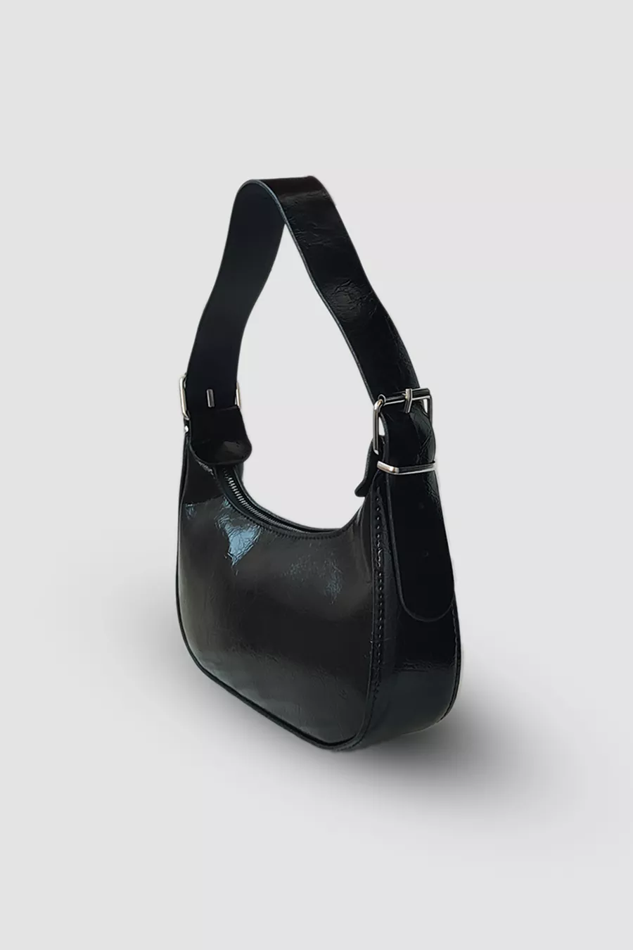 Sac à bandoulière en cuir verni noir