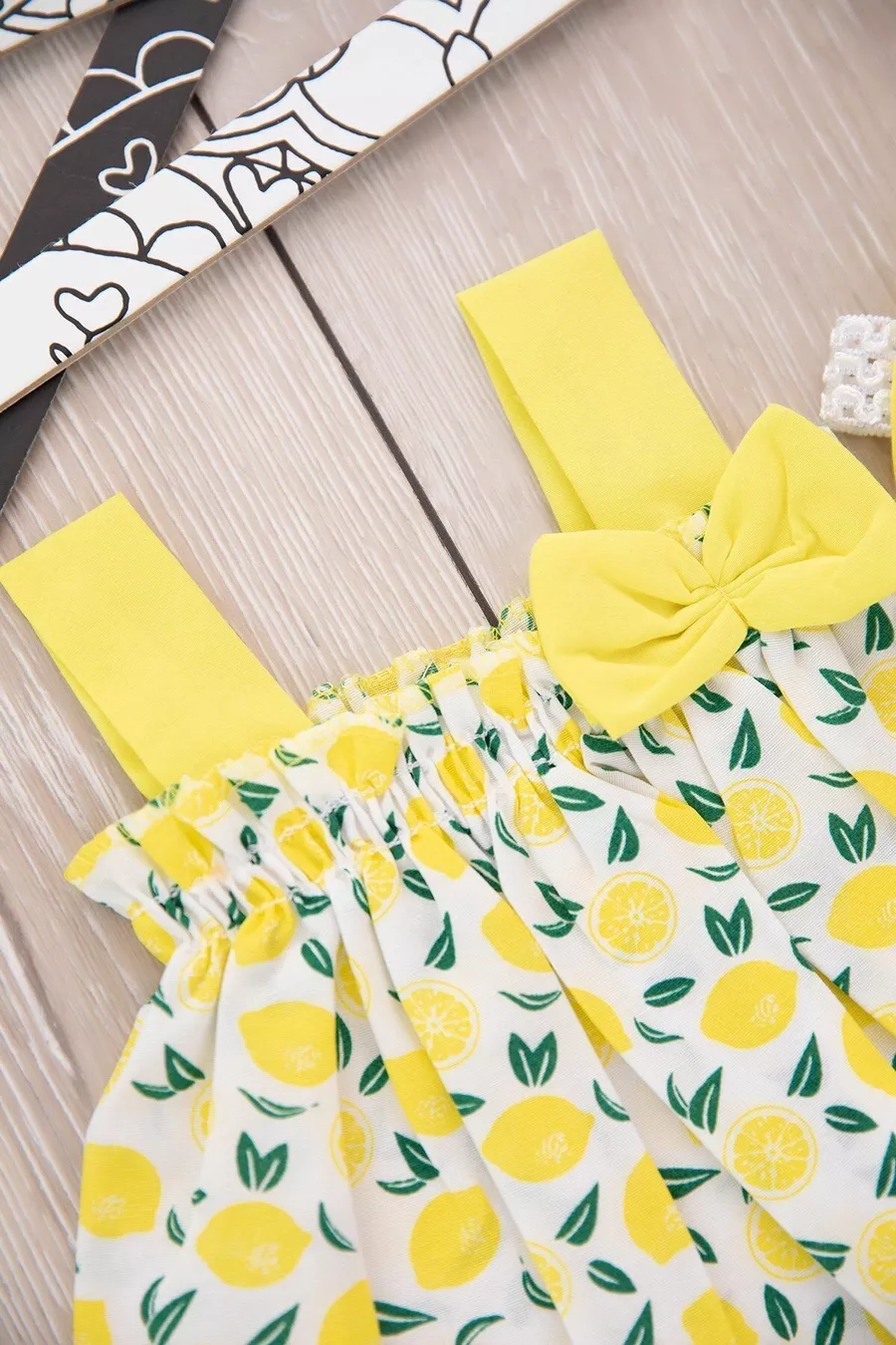Ensemble pour bébé fille jaune avec imprimé mandarine