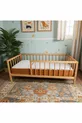 Lit pour enfant rond à lattes en bois massif naturel sur pieds, dimensions cm X cm