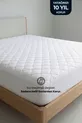 Protège-matelas en coton matelassé avec bord complet, blanc