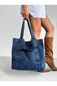 Sac en jean femme tendance modèle long à bretelles