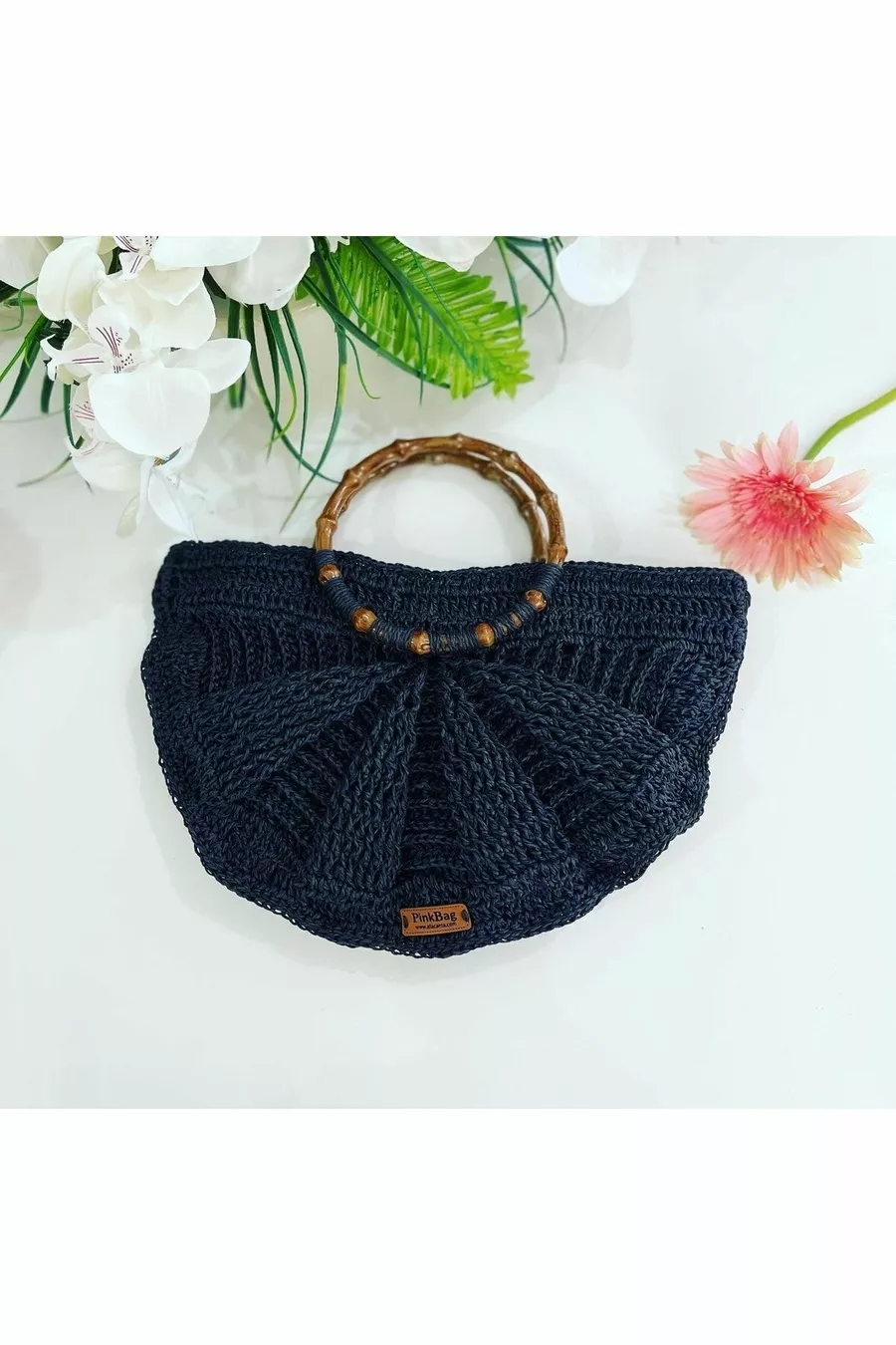 Sac à main artisanal en paille en forme de coquillage