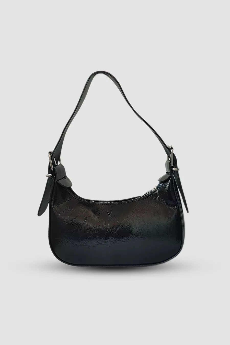 Sac à bandoulière en cuir verni noir