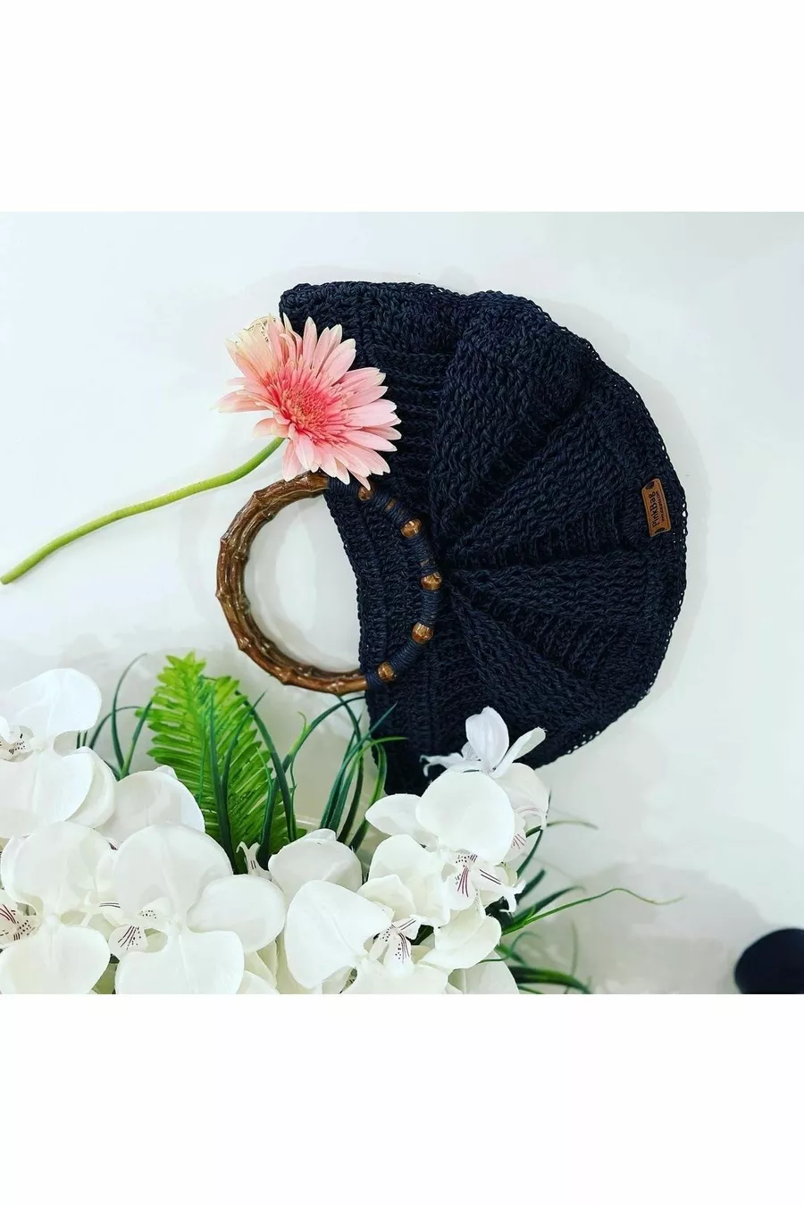 Sac à main artisanal en paille en forme de coquillage