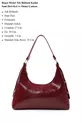 Sac à main et à épaule pour femme en cuir synthétique bordeaux à texture froissée, modèle , à un compartiment, forme baguette