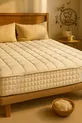 Matelas de sommeil capitonné en laine avec élastiques aux quatre coins